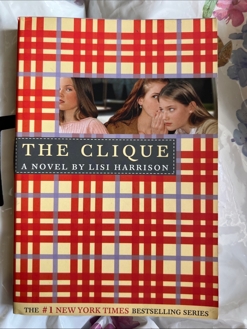 Paperback book “The Clique” by Lisi Harrison